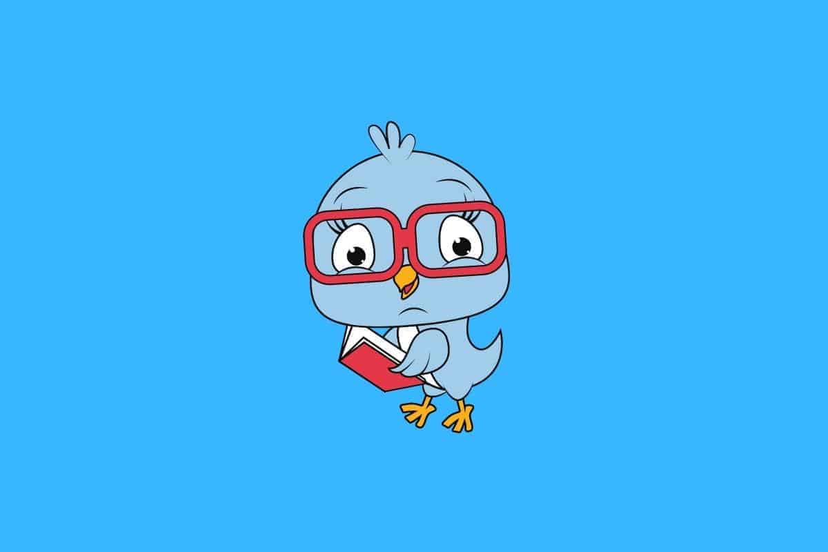 Cartoon graphic of blue bird reading red book on blue background.