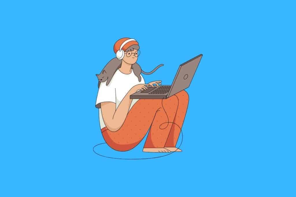 Cartoon graphic of siting girl typing on laptop on blue background.