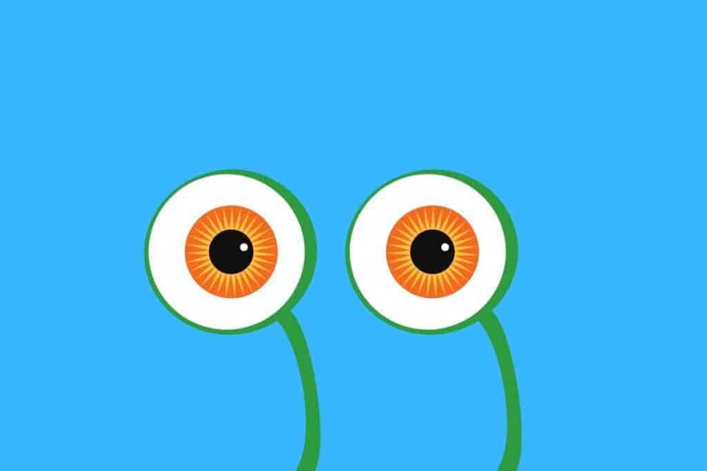 Cartoon graphic of two large snail eyes on blue background.