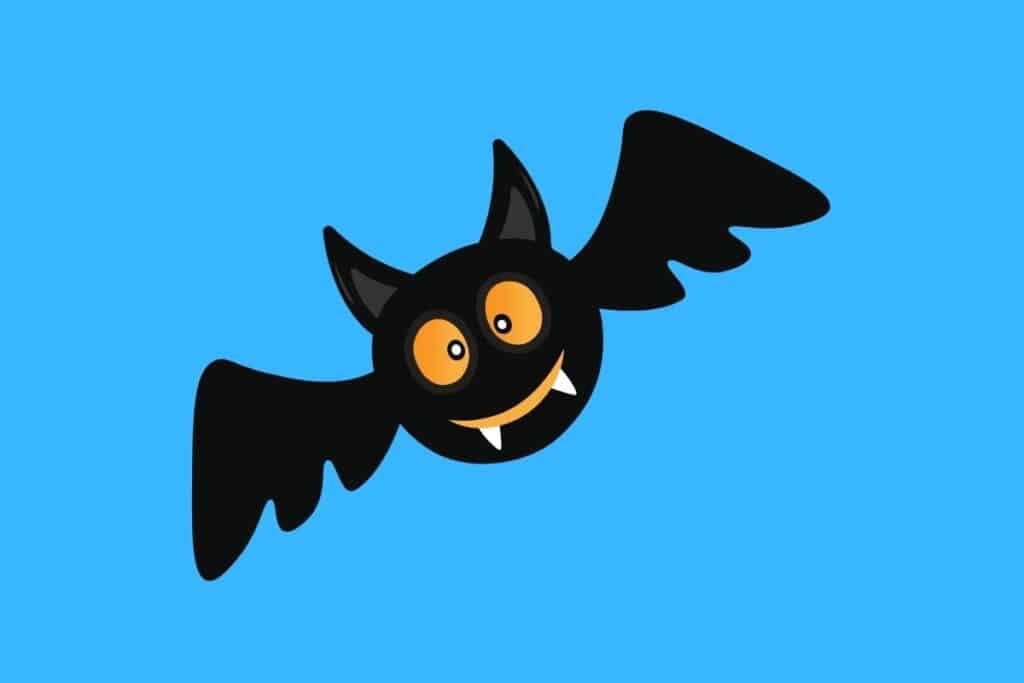 Cartoon graphic of happy bat with fangs on blue background.