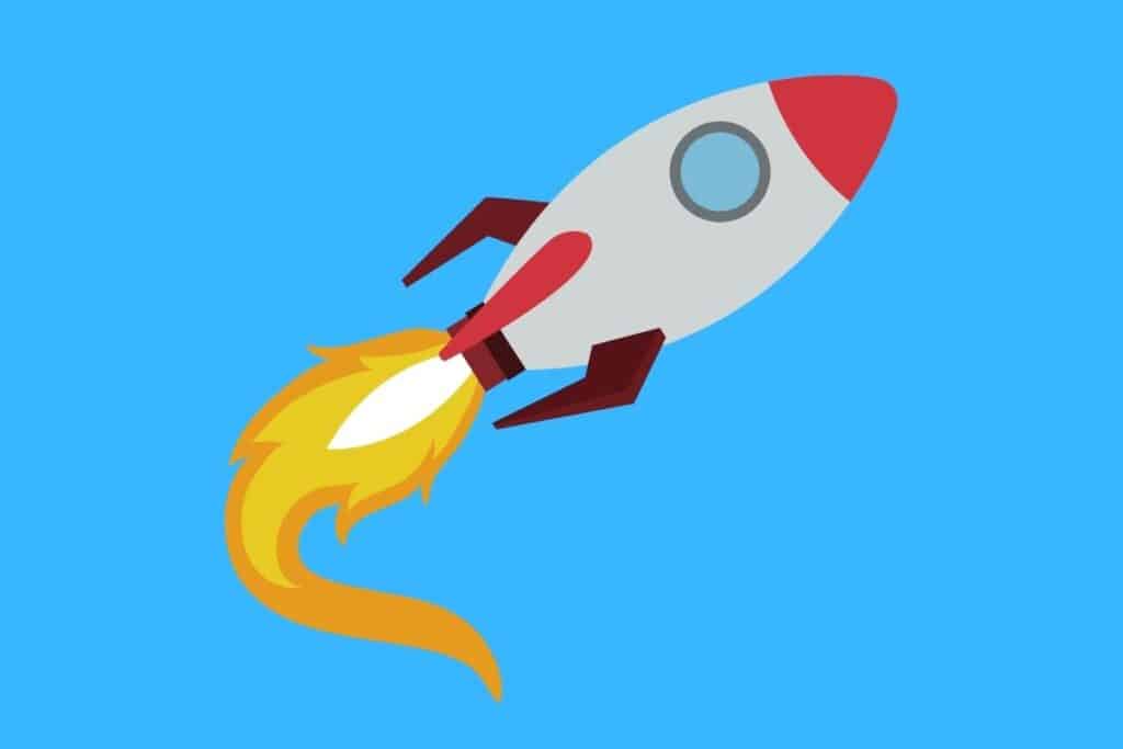 Cartoon graphic of rocket flying fast on blue background.