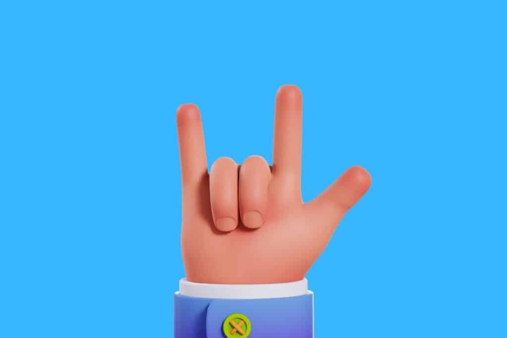 Cartoon graphic of hand doing rock on sign on blue background.