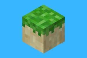 Cartoon graphic of Minecraft grass block on a blue background.