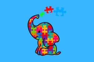 Cartoon graphic of an elephant made out of colorful puzzle pieces on a blue background.