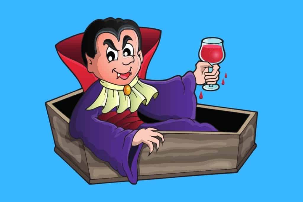 Cartoon graphic of a vampire coming out of a coffin holding a glass of blood on a blue background.