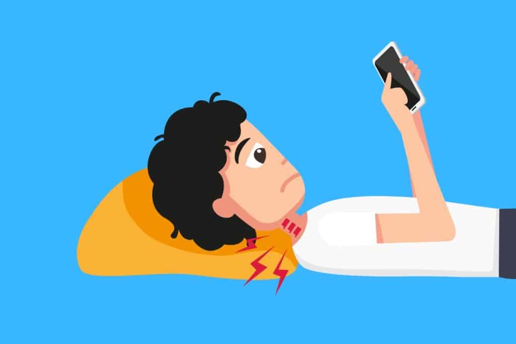 Cartoon graphic of a boy with a sore neck lying on a pillow looking at his phone on a blue background.